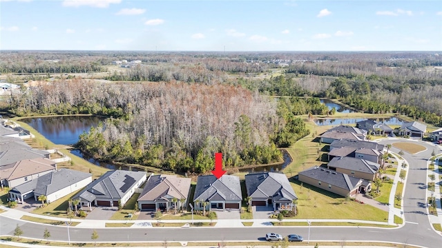 bird's eye view with a water view