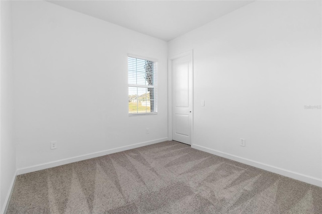 empty room featuring carpet flooring