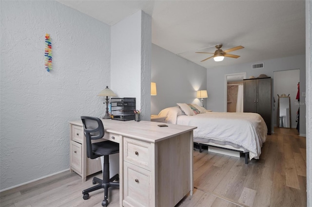 bedroom featuring ceiling fan and light hardwood / wood-style floors