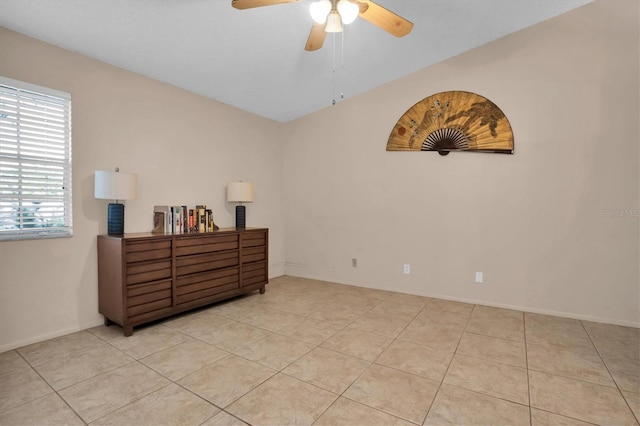 tiled bedroom with ceiling fan