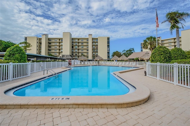 view of swimming pool with a patio area