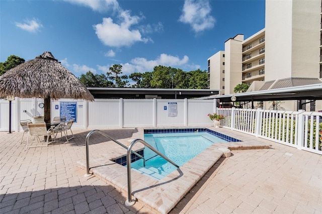 view of pool featuring a patio