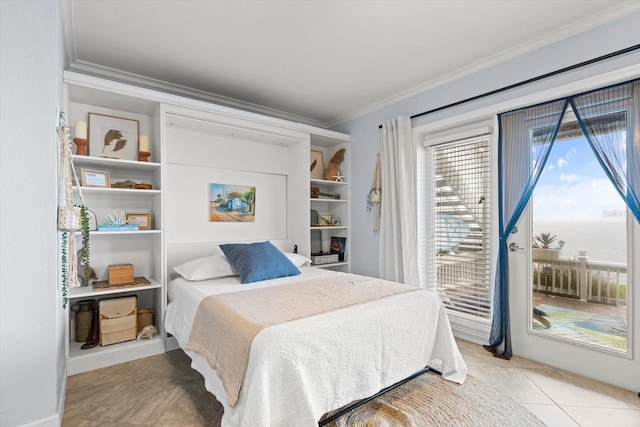 tiled bedroom featuring a water view and crown molding