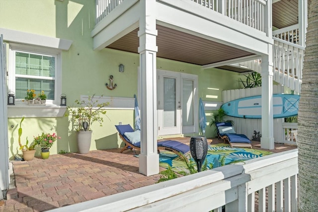 view of patio featuring a balcony