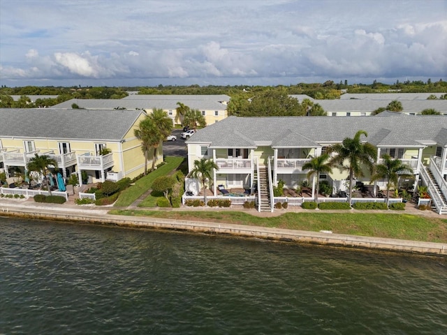 drone / aerial view with a water view