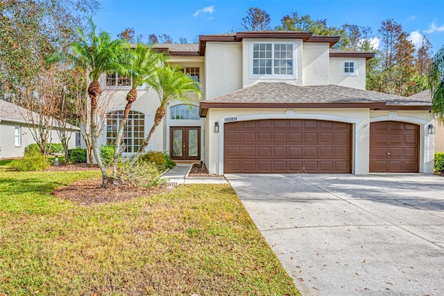 view of front of house featuring french doors and a garage