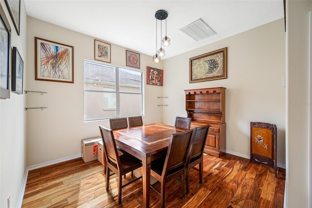 dining room featuring hardwood / wood-style flooring