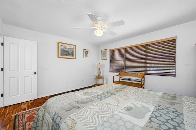 bedroom featuring ceiling fan and hardwood / wood-style floors