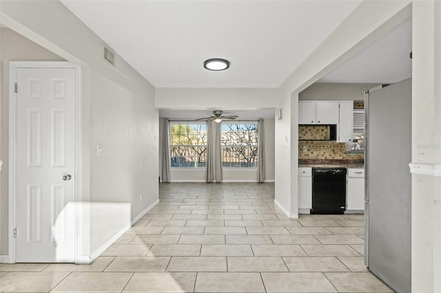 kitchen featuring decorative backsplash, ceiling fan, dishwasher, white cabinetry, and stainless steel refrigerator