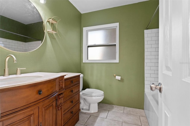 full bathroom featuring tile patterned floors, vanity, toilet, and shower / tub combination