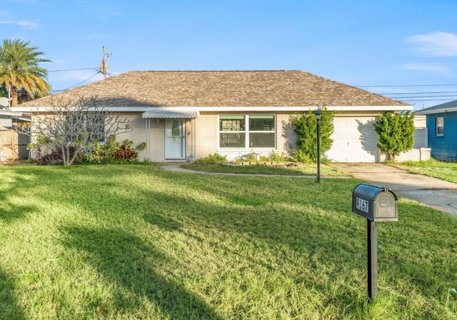 ranch-style home with a front yard and a garage