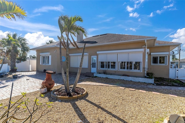 rear view of house featuring a patio area