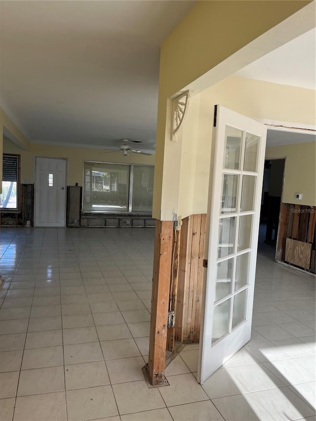 hall featuring light tile patterned floors