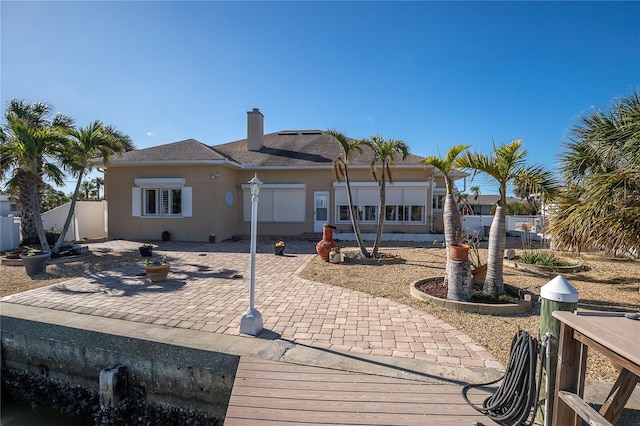 rear view of house featuring a patio area