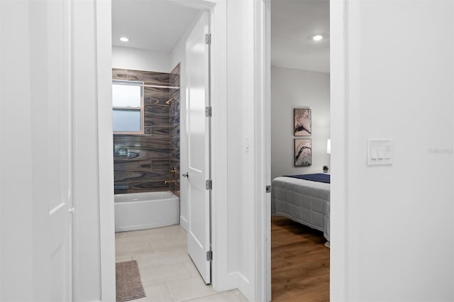 bathroom with hardwood / wood-style flooring