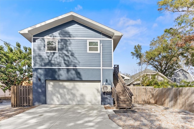 view of property exterior with a garage