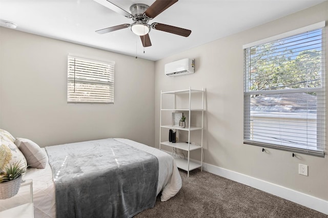 bedroom featuring carpet, an AC wall unit, and ceiling fan