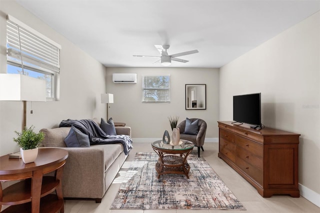 tiled living room featuring ceiling fan and a wall unit AC