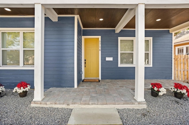 entrance to property with covered porch