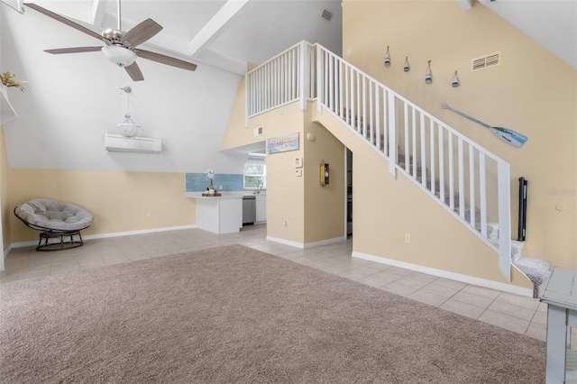 unfurnished living room with beam ceiling, light carpet, high vaulted ceiling, and ceiling fan