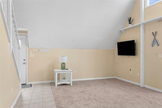 laundry area with light colored carpet