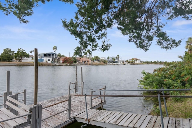 dock area with a water view