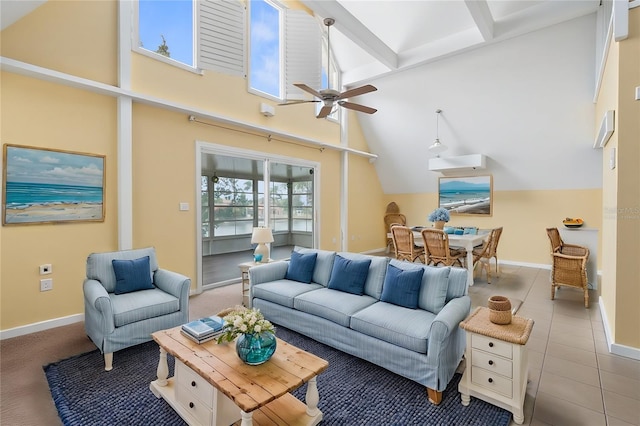 tiled living room featuring high vaulted ceiling, baseboards, beamed ceiling, and ceiling fan