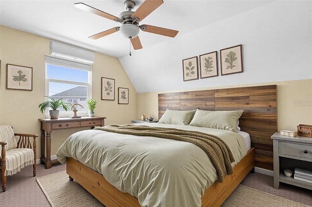 carpeted bedroom featuring baseboards, a ceiling fan, lofted ceiling, and a wall unit AC