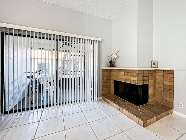 living room with a textured ceiling, a brick fireplace, and lofted ceiling