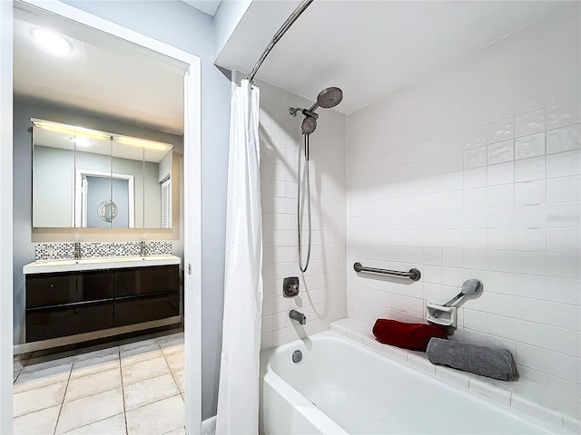 bathroom with tile patterned flooring, shower / tub combo, and vanity