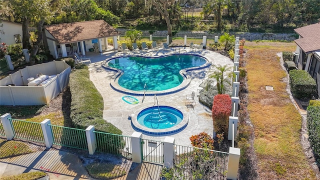 view of pool with a community hot tub and a patio