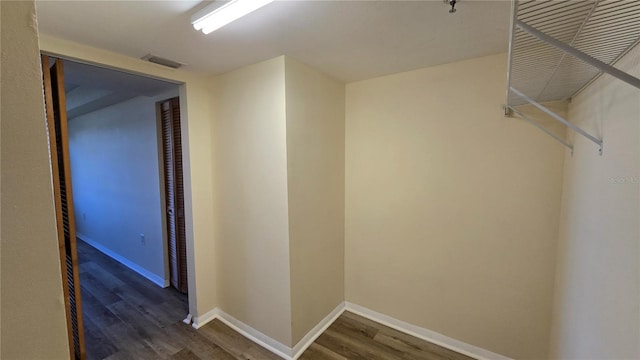 interior space with dark hardwood / wood-style flooring