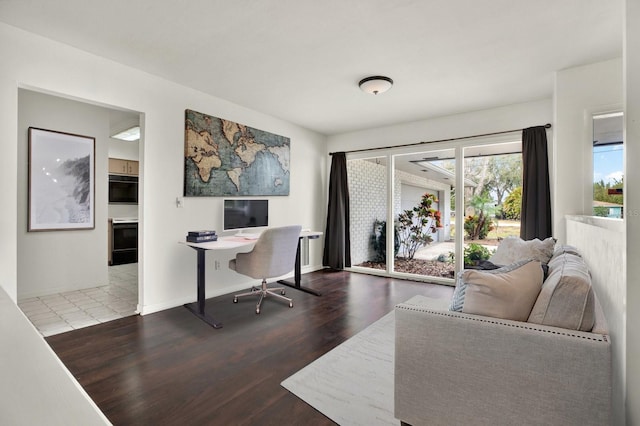 home office featuring hardwood / wood-style flooring