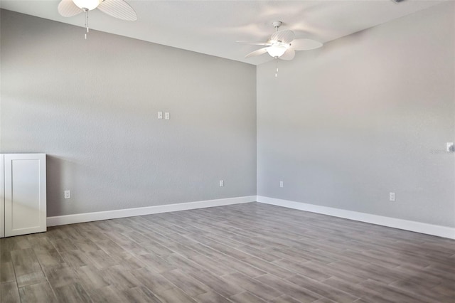 unfurnished room featuring ceiling fan and light hardwood / wood-style flooring