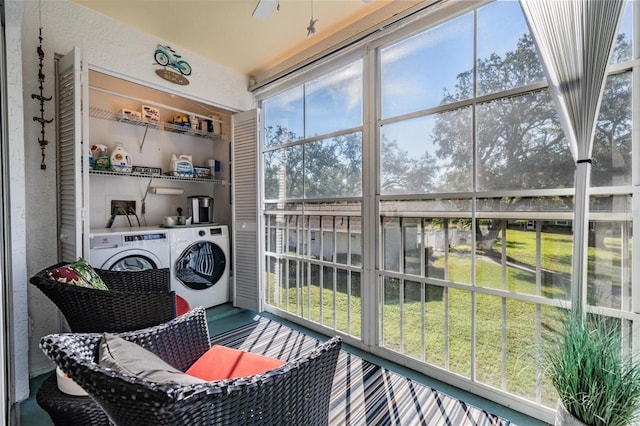 sunroom with washer and dryer