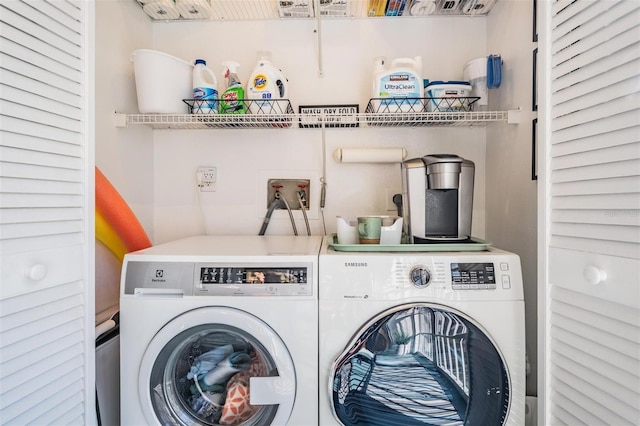 laundry room featuring separate washer and dryer