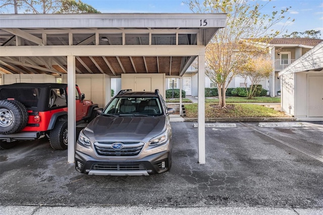 view of parking featuring a carport