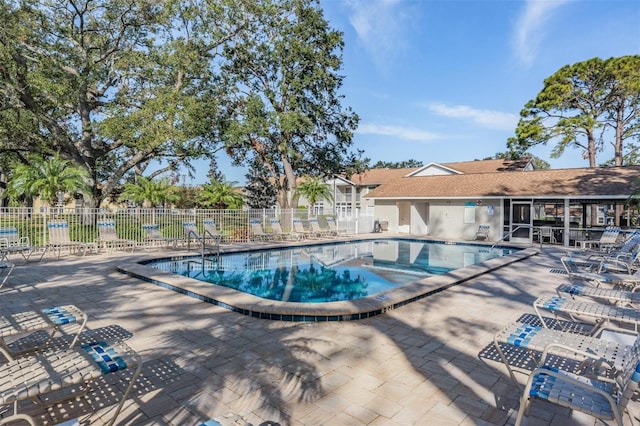 view of swimming pool featuring a patio