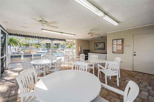 dining room with ceiling fan