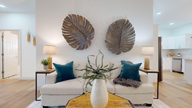 sitting room featuring light hardwood / wood-style floors