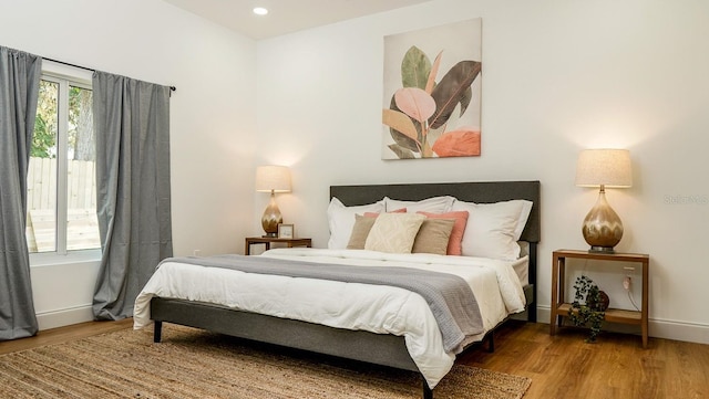 bedroom featuring wood-type flooring