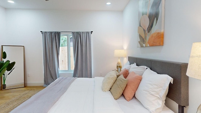 bedroom featuring hardwood / wood-style floors