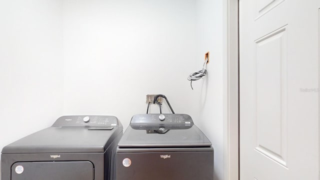 washroom featuring separate washer and dryer