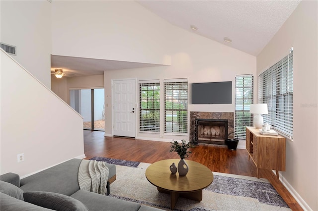 8737 Bardmoor Pl Unit 101, Seminole, FL 33777 - living room with a wealth of natural light, dark wood-style flooring, and visible vents