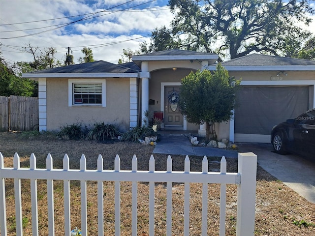 ranch-style home with a garage