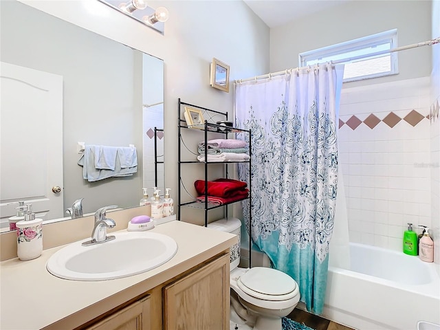 full bathroom with shower / tub combo, vanity, and toilet