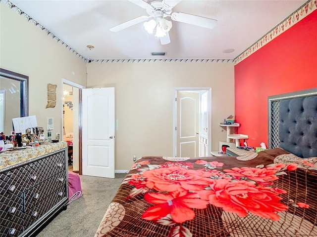 bedroom with ceiling fan and light carpet