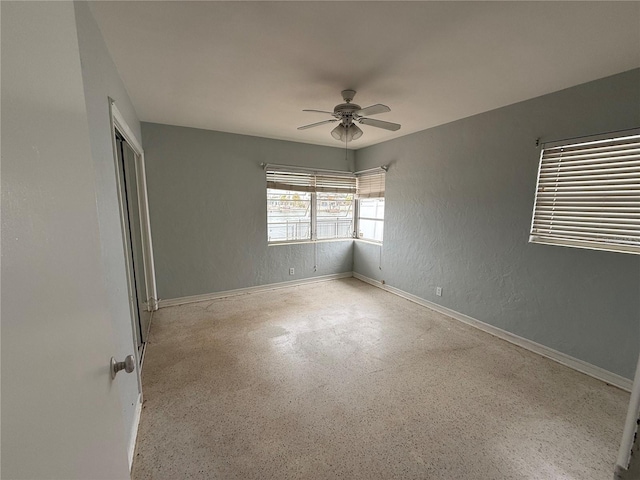 spare room featuring ceiling fan