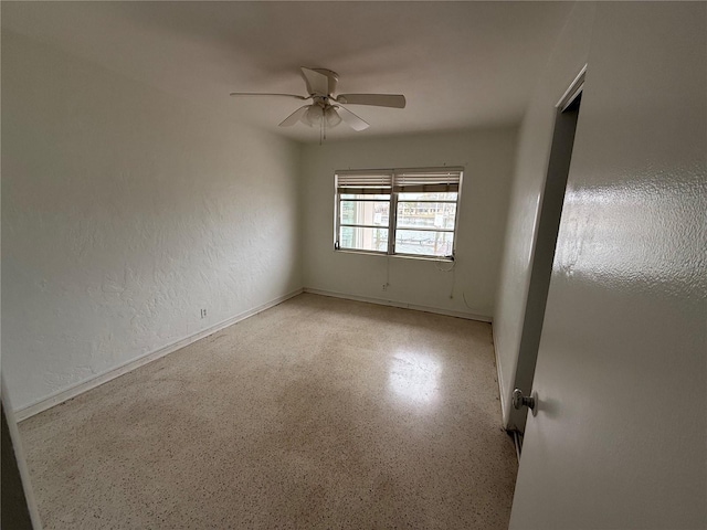 unfurnished room featuring ceiling fan