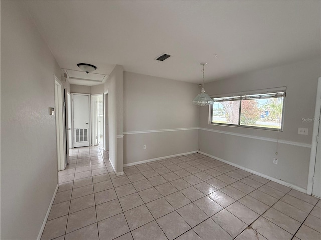 view of tiled spare room